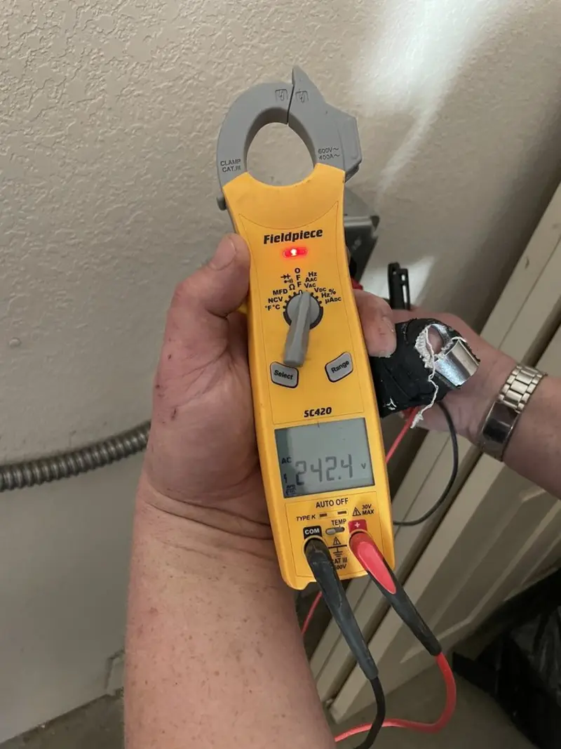 Voltage testing with clamp meter during Aluminum Wiring Replacement in Long Beach